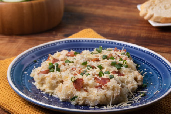 Disfruta Risotto de coliflor y pechuga de pollo desmechada